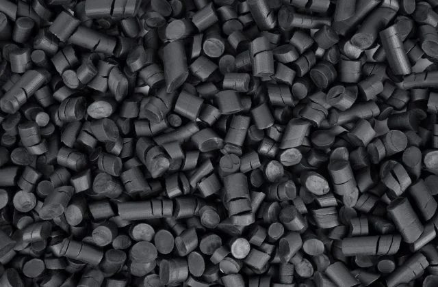 Black rubber granules background